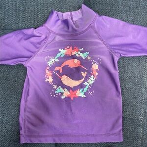 Little girl’s swimwear in good condition with matching sunhat.